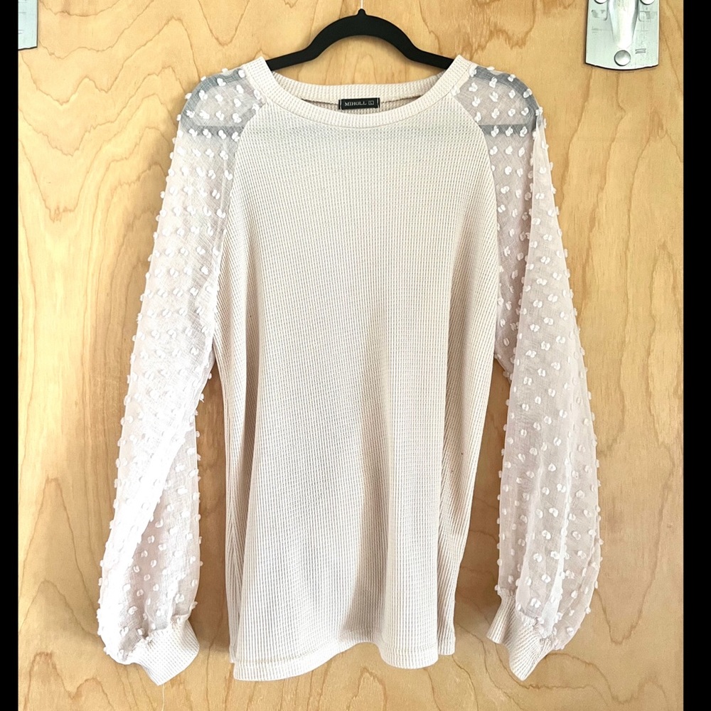 Cream colored, embellished sleeve top